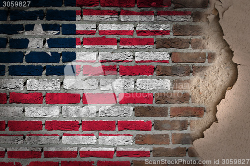 Image of Dark brick wall with plaster - Liberia