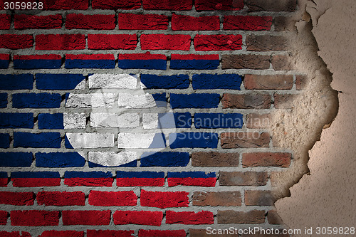 Image of Dark brick wall with plaster - Laos