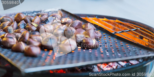 Image of Grilling chestnuts.