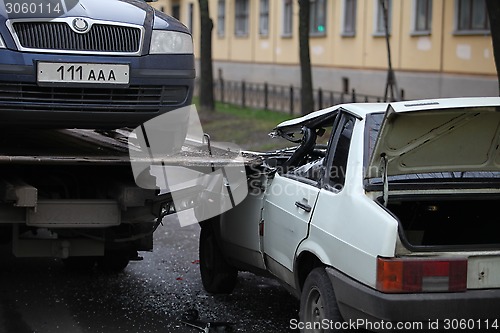 Image of accident with a car tow truck