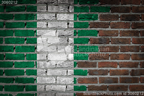 Image of Brick wall texture with flag