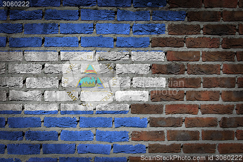 Image of Brick wall texture with flag