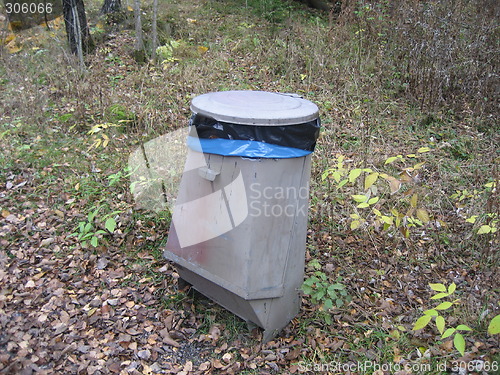 Image of Lonely garbage container in the forest