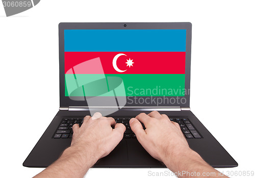 Image of Hands working on laptop, Azerbaijan