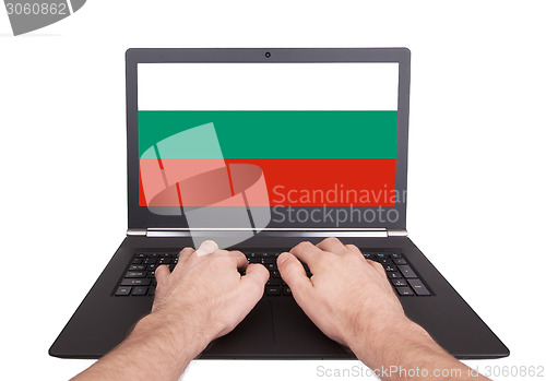 Image of Hands working on laptop, Bulgaria