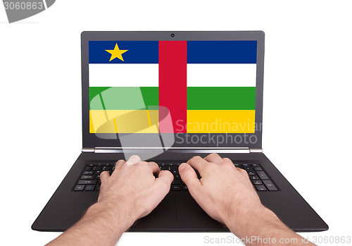 Image of Hands working on laptop, Central African Republic