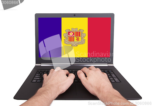 Image of Hands working on laptop, Andorra