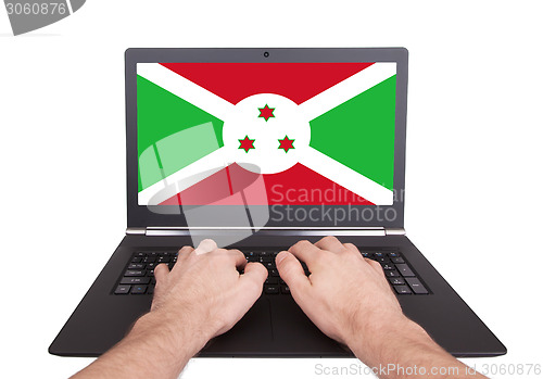 Image of Hands working on laptop, Burundi