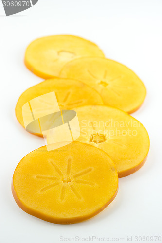Image of orange persimmon slices 