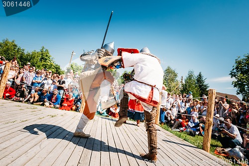 Image of Knights In Fight With Sword. Restoration Of Knightly Battle