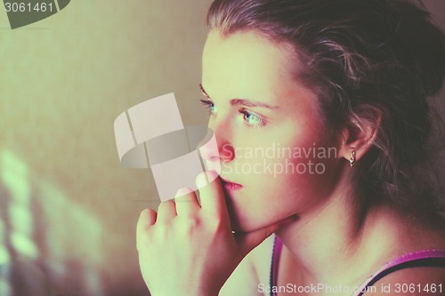 Image of Young Pensive Teen Girl. Toned Instant Photo