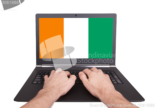 Image of Hands working on laptop, Ireland