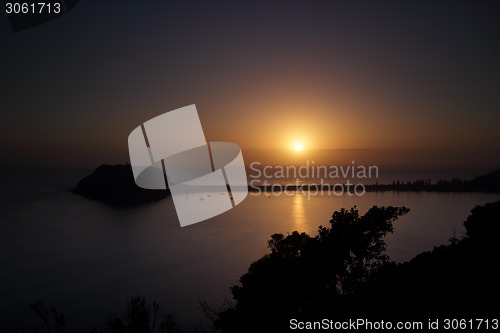 Image of Tranquil sunrise and silhouettes over Pittwater, Broken Bay, Pal