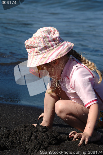 Image of Child playing at the beach