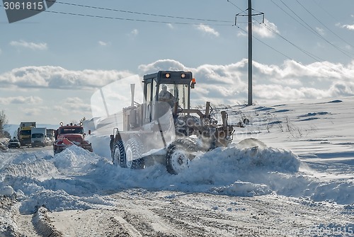 Image of Snow grader in action