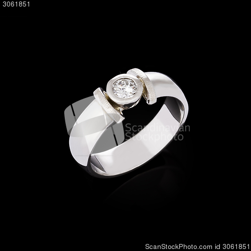 Image of Diamond ring on black background