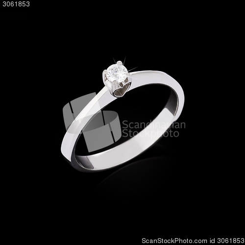Image of Diamond ring on black background