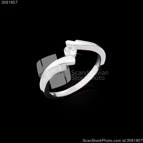 Image of Engagement diamond ring on black background