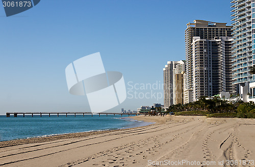 Image of Skyline and pier along the beach of Sunny Isles Beach, Florida