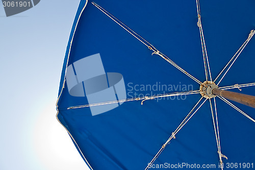 Image of Sun umbrella on a bright, sunny day