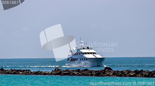 Image of Luxury yatch coming into port