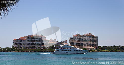 Image of Luxury yatch sails past Fisher Island in Miami, Florida