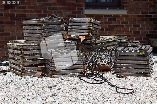 Image of Vintage lobster traps on the shore