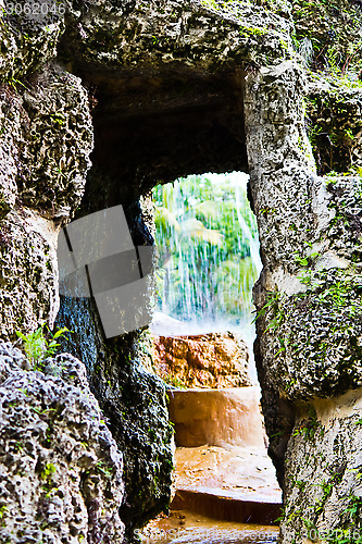 Image of Decorative waterfall in a garden