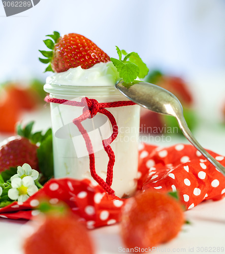 Image of Fresh strawberries with healthy yogurt