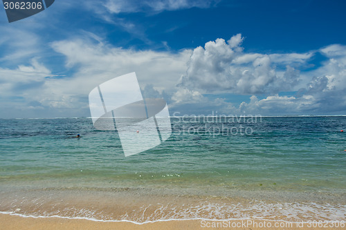 Image of Beautiful tropical beach with lush vegetation