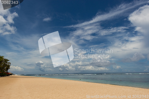 Image of Beautiful tropical beach with lush vegetation