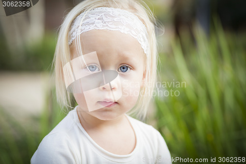 Image of Adorable Little Girl Portrait Outside