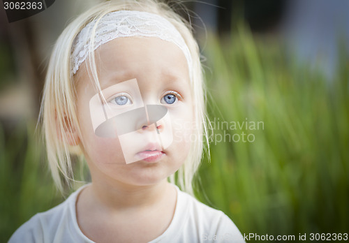 Image of Adorable Little Girl Portrait Outside