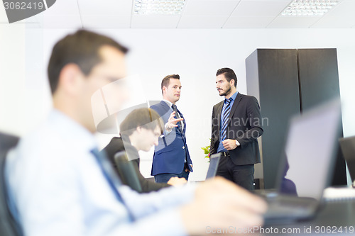 Image of Business people in modern office.