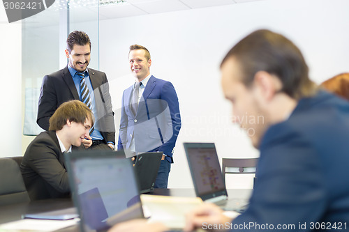 Image of Business people in modern office.