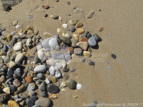 Image of Sand background with sea pebbles