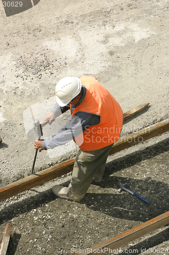 Image of Hammering into hard ground