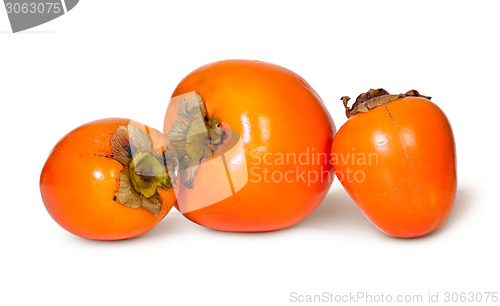 Image of Three Whole Persimmons