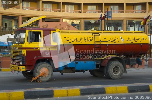 Image of Old tanker truckwith blocking device on wheel