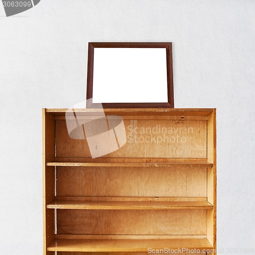 Image of Wooden book Shelf and photo frame