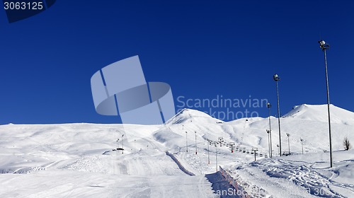 Image of Winter mountains and ski slope at nice sun day