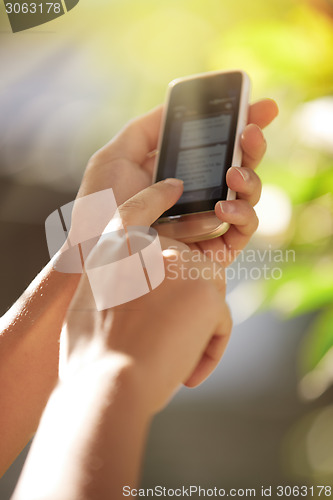 Image of Hands with smartphone