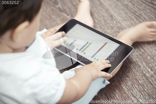 Image of Baby with tablet computer