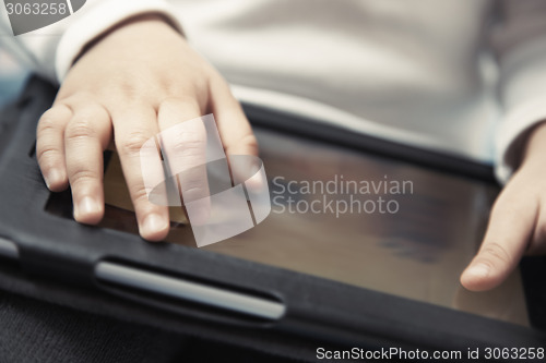 Image of Baby with digital tablet