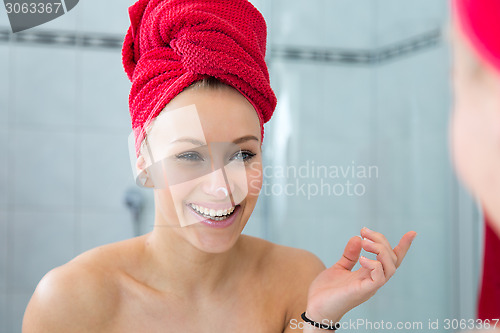 Image of Girl in front of the mirror