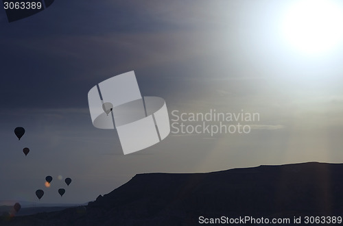 Image of Silhouette of air balloons in the sky