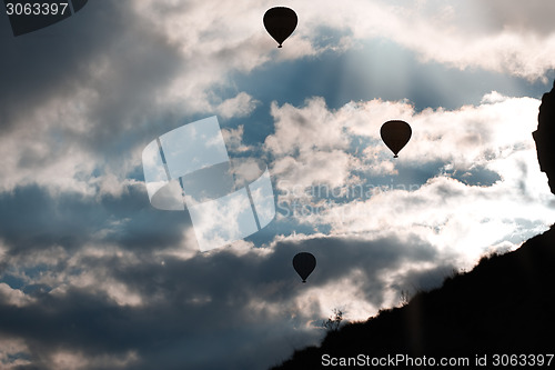 Image of Silhouette of air balloons in the sky