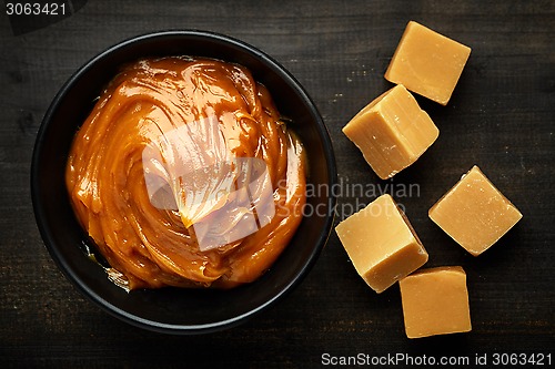 Image of Bowl of melted caramel cream