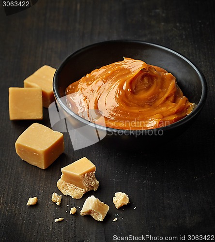 Image of Bowl of melted caramel cream