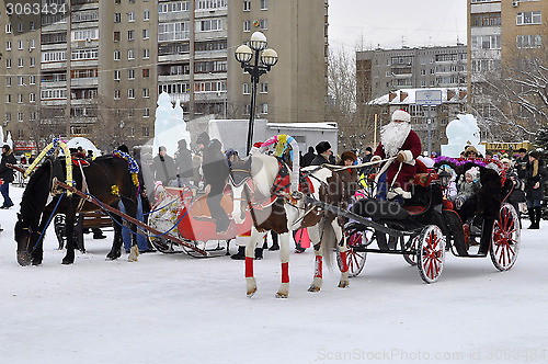 Image of Festive drivings in the carriage with Father Frost